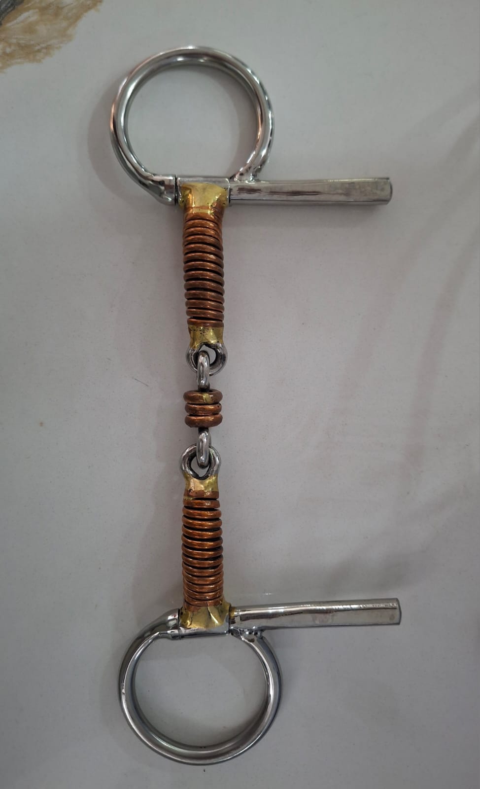 Bit Driving snaffle with roller and half spoon sides